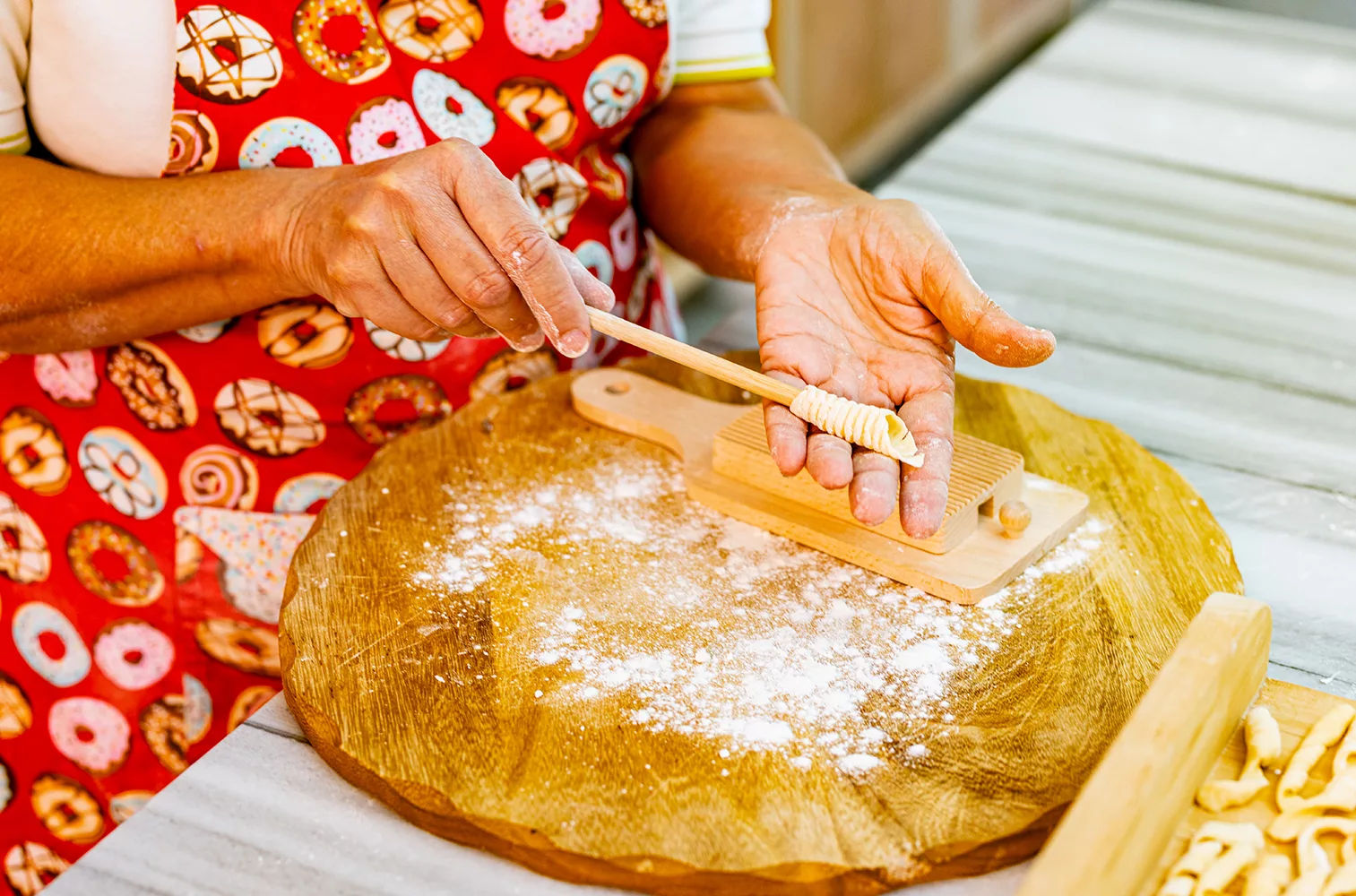 Mamma Giulietta shaping fresh pasta by hand at a Perth workshop